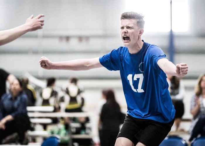 WATERLOO, ON, May 17, 2017: WATERLOO, ON - MAY 7, 2017: Players from the Barrie Elites Volleyball Club celebrate a kill at the U15 East Volleyball Canada Nationals.