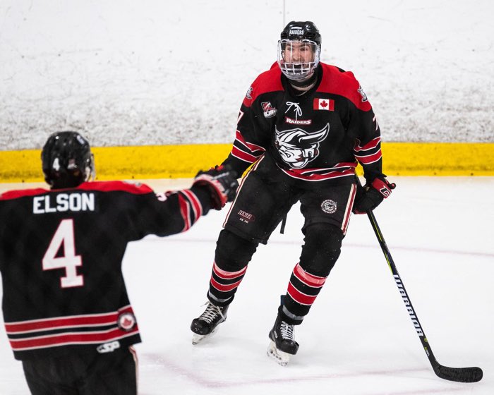 TORONTO, ON: TORONTO, ON - Apr. 10, 2018: Andrew Cordssen-David of the Georgetown Raiders celebrates a goal scored with teammate Zac Elson during game seven of the OJHL Southwest Conference championship.