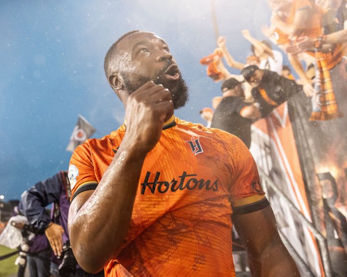 HAMILTON, ON, Jul. 10, 2024: Jordan Hamilton of Forge FC celebrates with the Barton Street Battalion after a 2-1 win over Toronto FC during Canadian Championship semi-final action.
