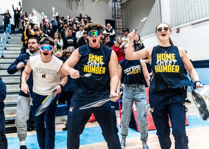 OAKVILLE, ON - Feb. 25, 2023: Humber Hawks fans celebrate during the Ontario Colleges Athletic Association Women’s Volleyball Championship game.