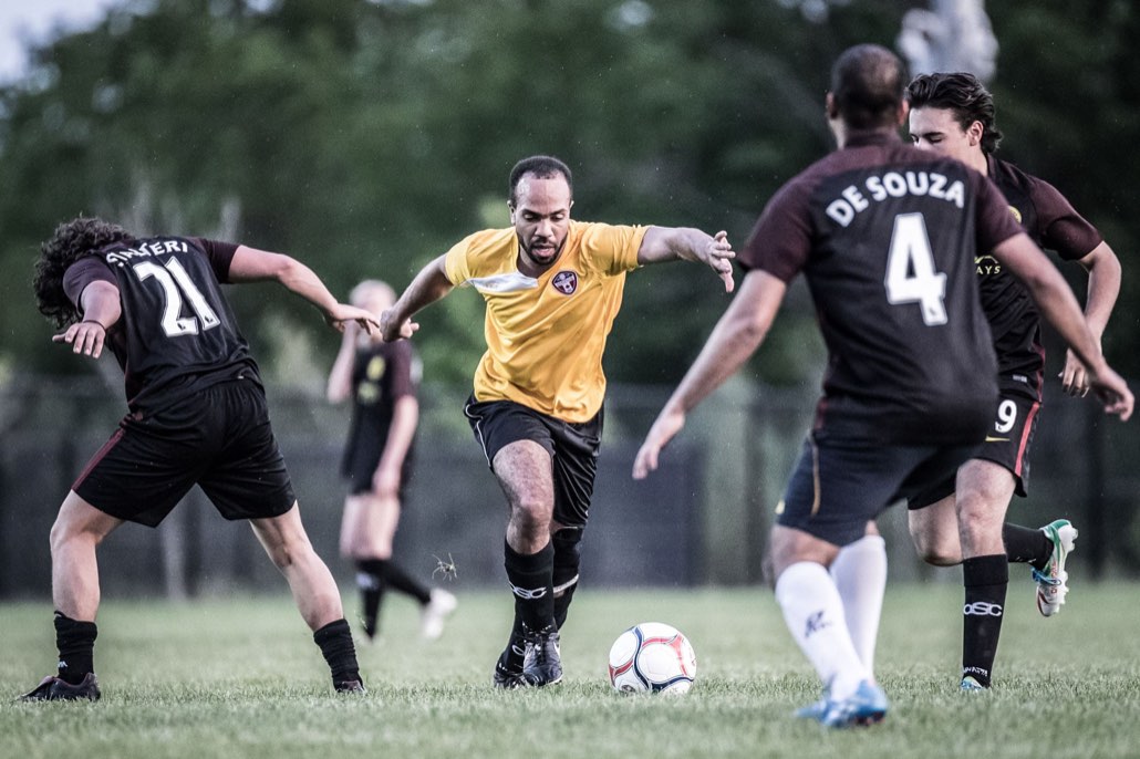 OAKVILLE, ON - May 29, 2017: A player takes on the entire opposition by himself.