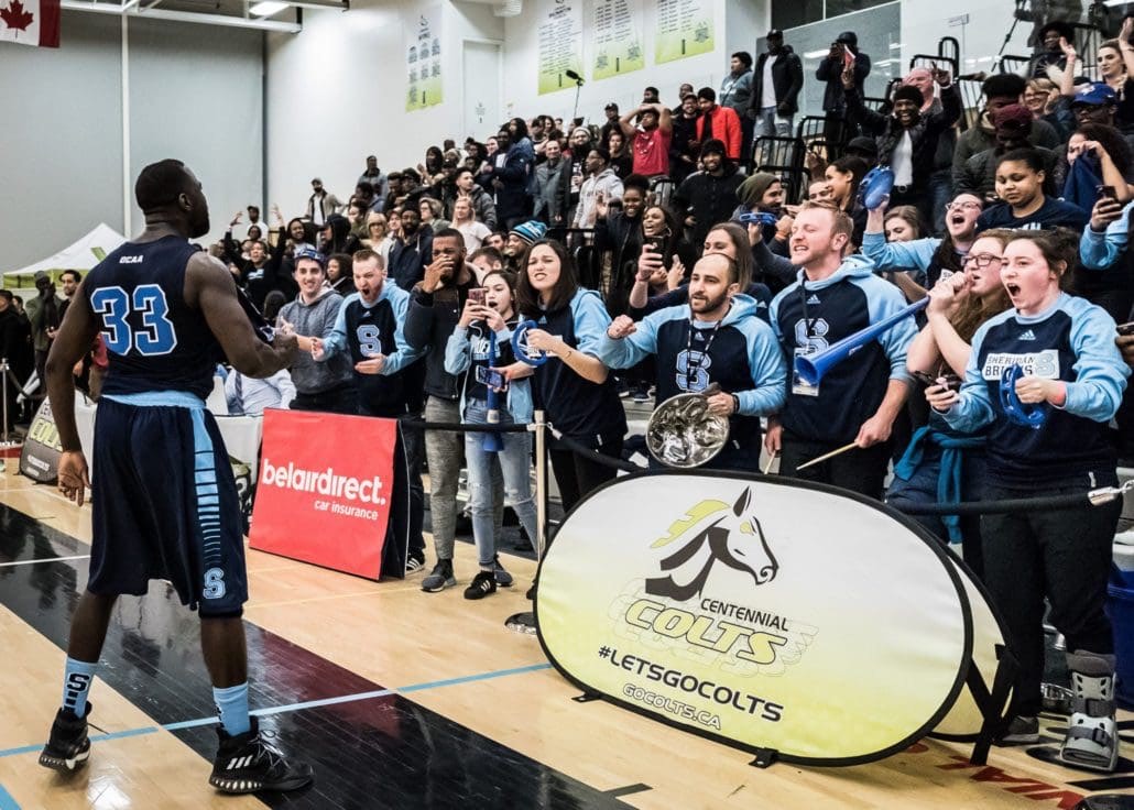 TORONTO, ON – Mar. 4, 2017: After scoring the championship-winning bucket, Brian Owusu celebrates alongside Bruins fans.
