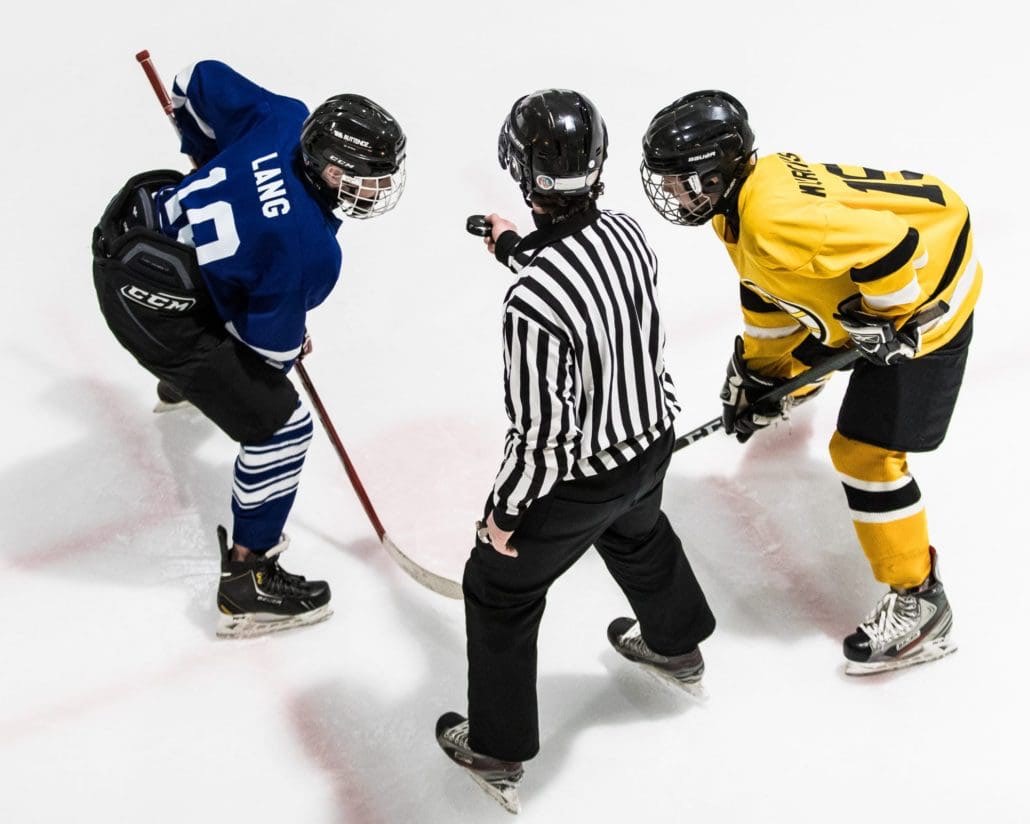 BURLINGTON, ON - Apr. 8, 2017: Players prepare to face-off in Wave Hockey action.