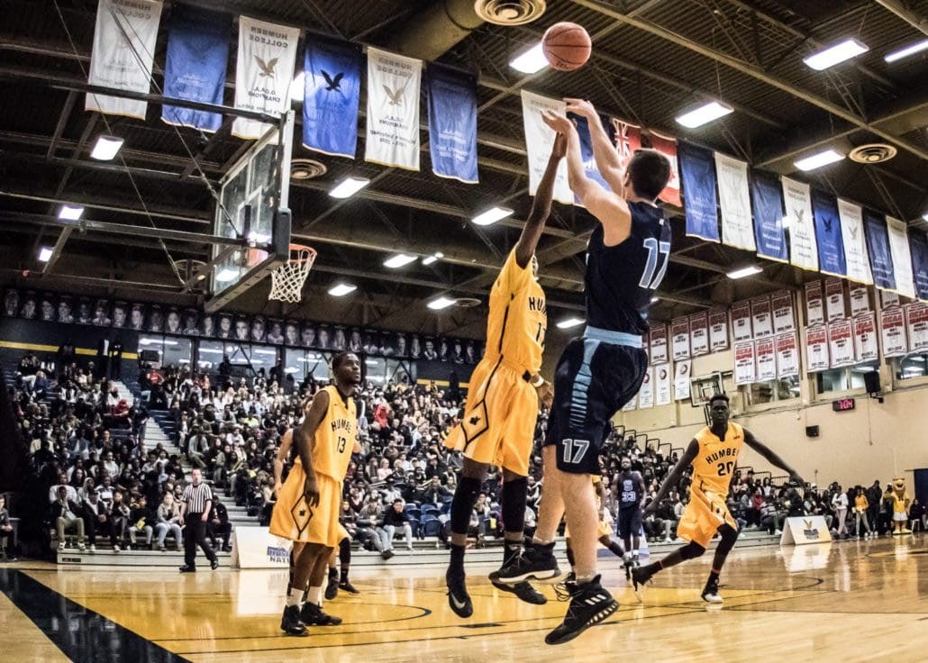 TORONTO, ON – Nov. 12, 2016: Ostap Choliy of the Sheridan Bruins releases a jumper in OCAA regular season action against the Humber Hawks.