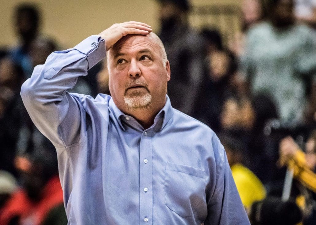 TORONTO, ON – Nov. 12, 2016: Sheridan Bruins head coach Jim Flack checks the clock with seconds to go against the Humber Hawks.