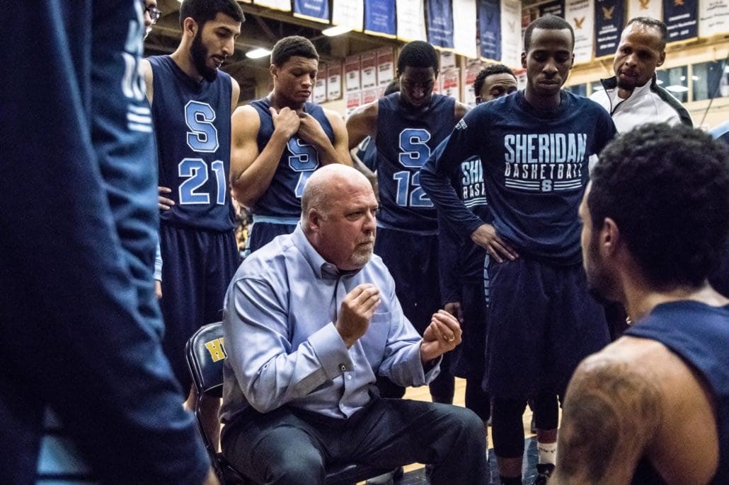 TORONTO, ON – Nov. 12, 2016: Sheridan Bruins head coach Jim Flack speaks to his players during a time-out.