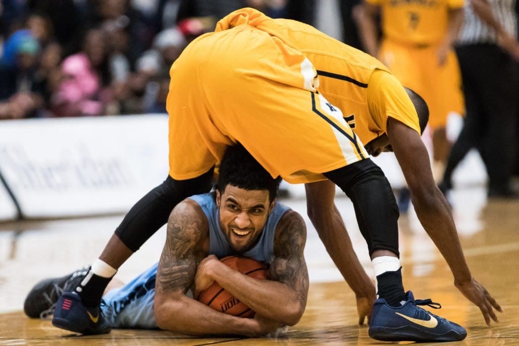 BRAMPTON, ON - Feb. 4, 2017: Dylan Periana grins after clutching a late-game loose ball against the Humber Hawks.