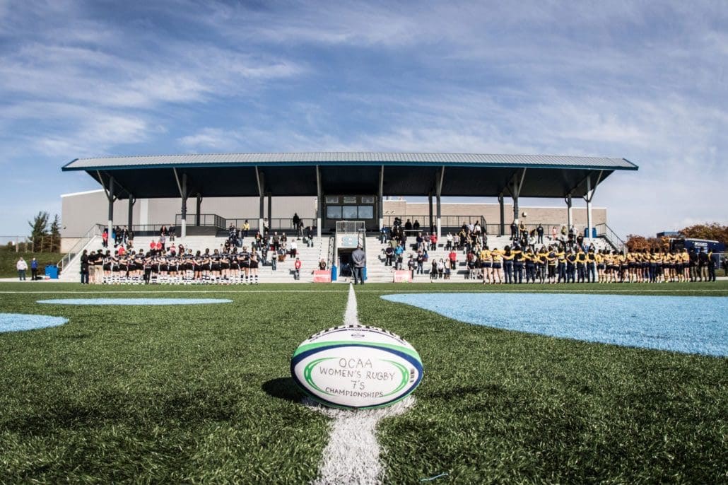 OAKVILLE, ON - NOV. 5, 2016: The Humber Hawks and Conestoga Condors line up for the OCAA's inaugural Women's Rugby Sevens championship.