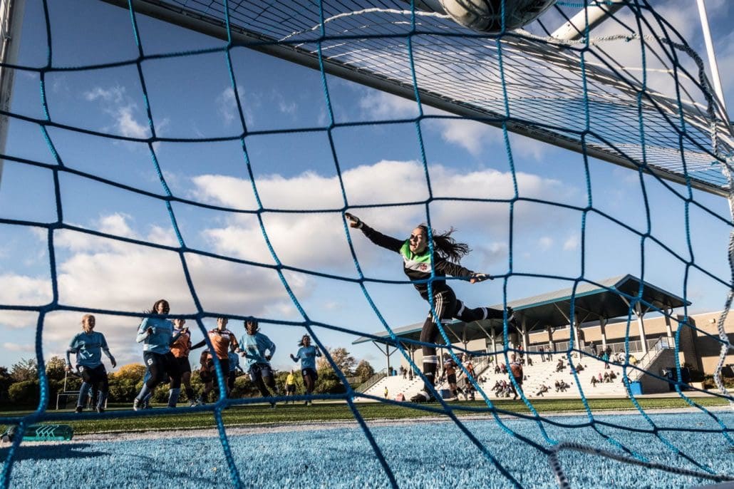 OAKVILLE, ON - OCT. 22, 2016: Mohawk Mountaineers goalkeeper dives and misses a Sheridan Bruins free kick.